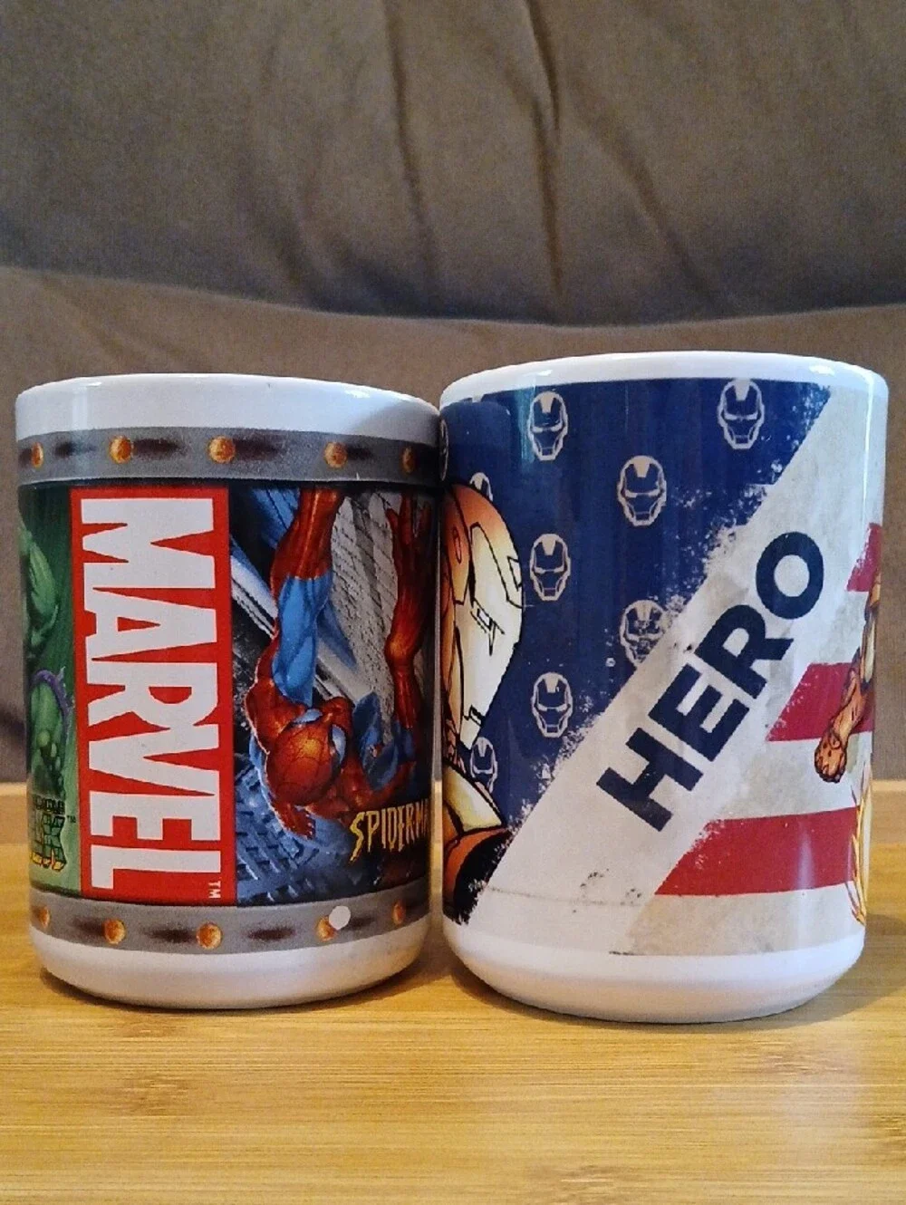 Marvel Ceramic Mug Duo — White with Green and Red and Red and Gold Artwork